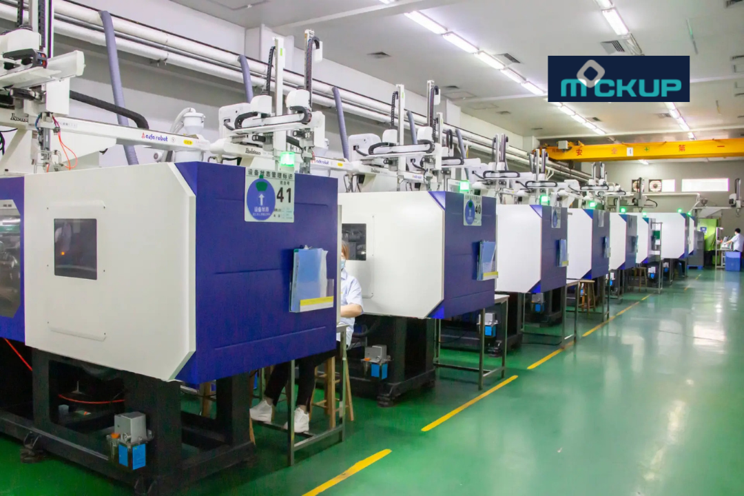 Row of automated injection molding machines