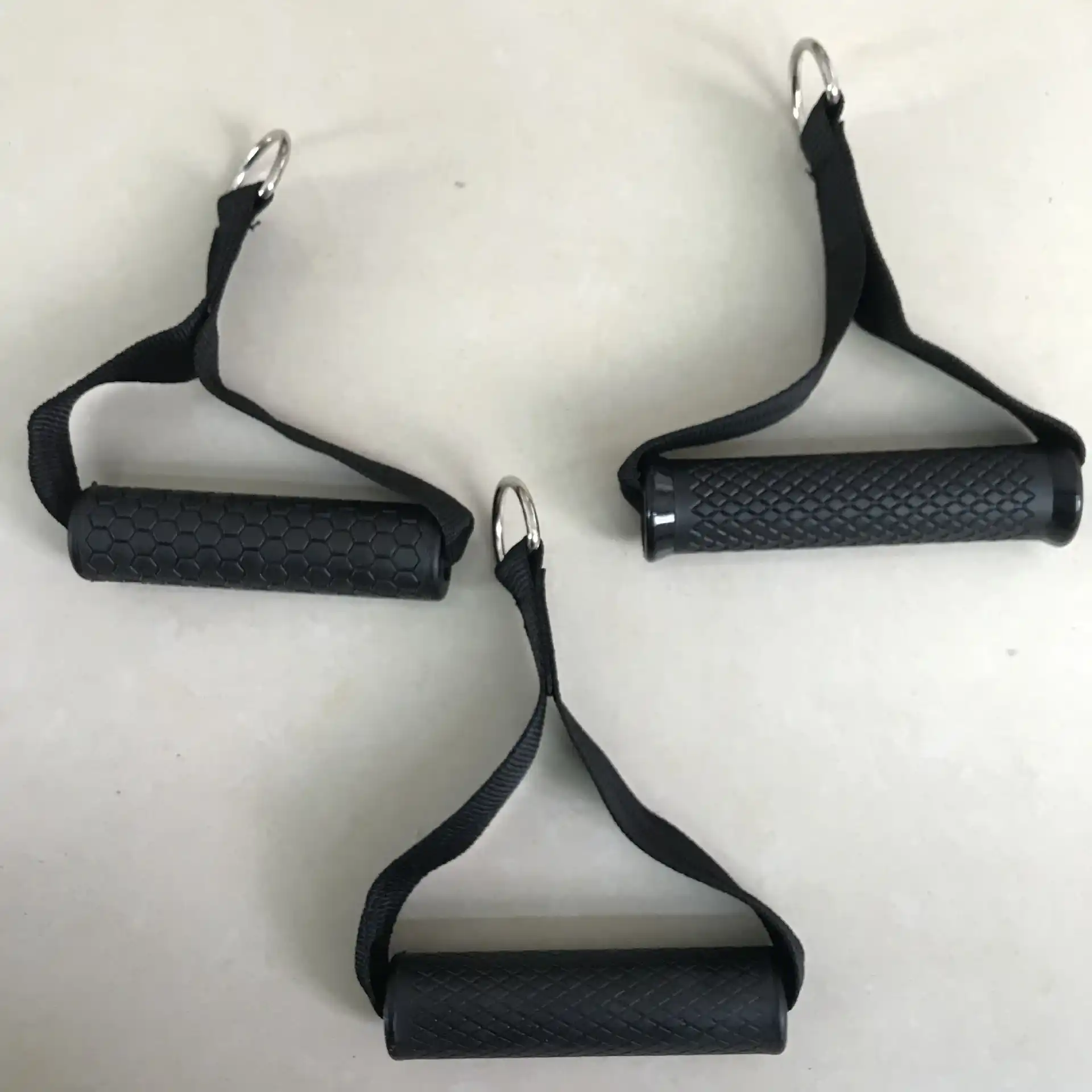 Real textured soft-grip handles produced with rigid and flexible material zones